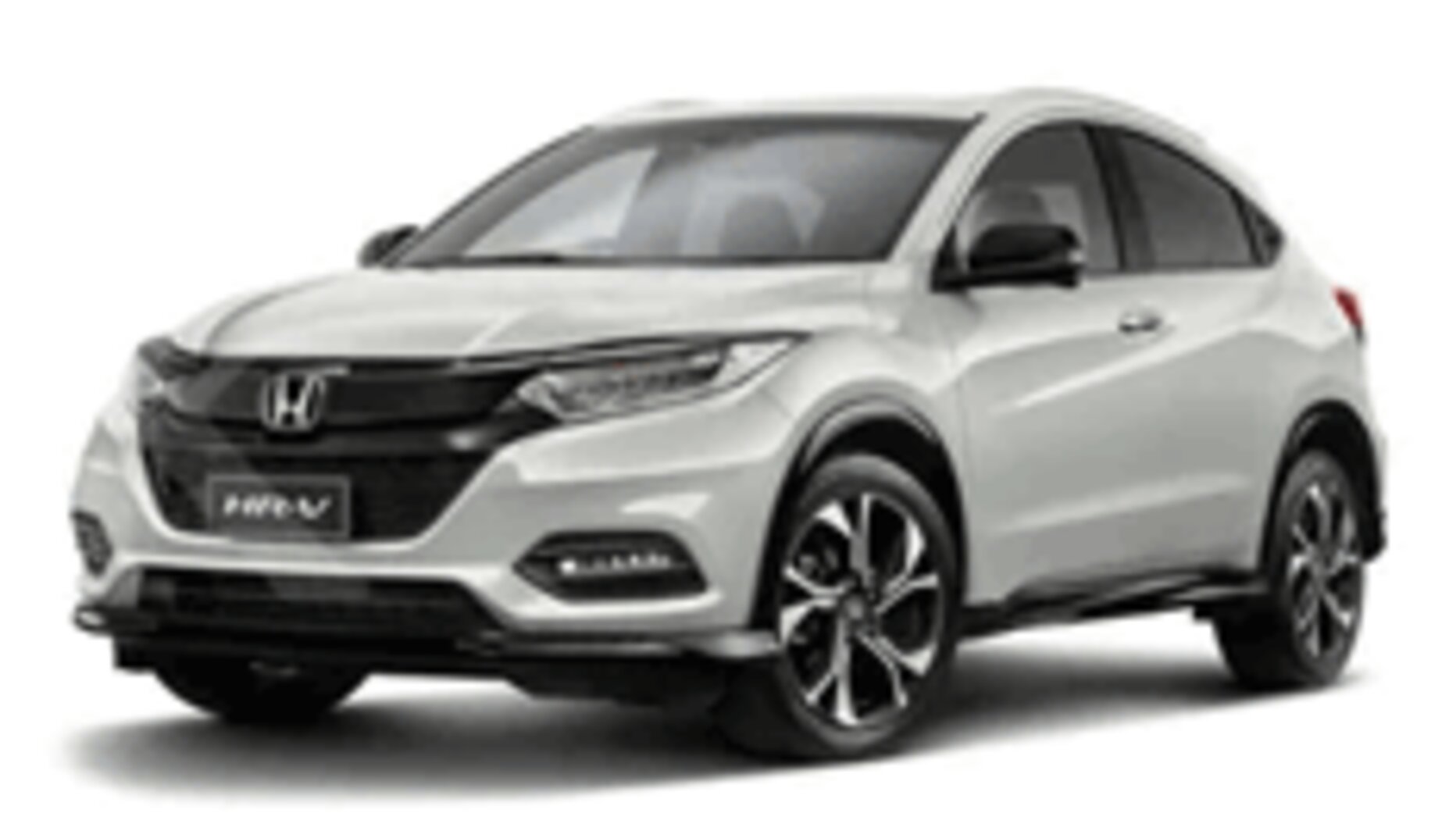 Honda HR-V warna putih difoto dari sudut depan samping, menampilkan desain compact SUV dengan grille depan hitam glossy solid tanpa banyak garis krom, headlamp LED tajam menyatu dengan lampu sein, serta velg alloy dua warna (dual-tone) yang sporty. Sebagai armada sewa mobil di Medan, HR-V menjadi pilihan SUV bergaya untuk pasangan, keluarga kecil, atau perjalanan bisnis yang mengutamakan tampilan elegan dan handling nyaman, baik untuk dalam kota maupun perjalanan ke luar kota seperti Berastagi.