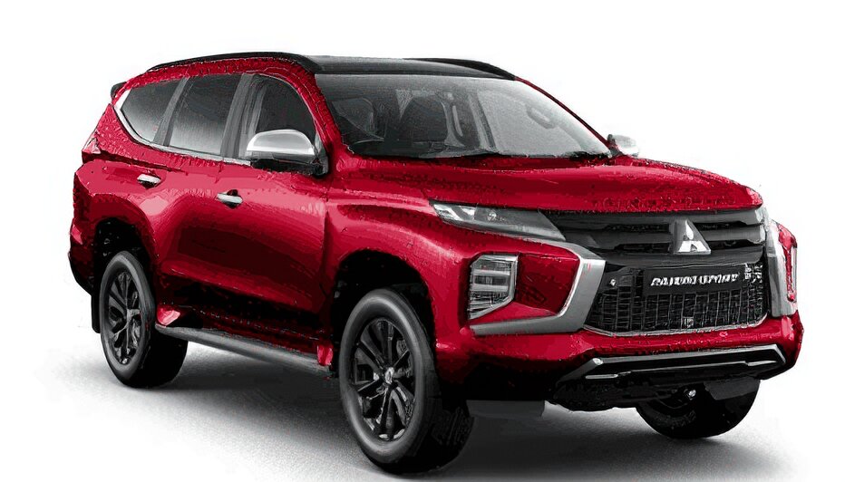 Mitsubishi Pajero Sport warna merah dengan atap hitam (two-tone) difoto dari sudut depan samping, menampilkan desain 